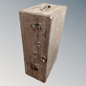 A vintage metal bound shipping trunk