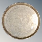 An Eastern brass tray,