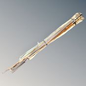 A bundle of eleven vintage split cane fishing rods