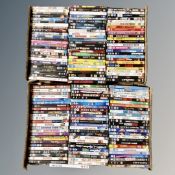 Two boxes containing approximately 150 dvds
