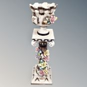 A Capo di Monte flower encrusted jardiniere on pedestal,