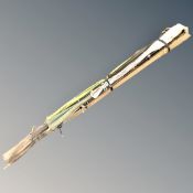 A bundle of nine assorted course fishing and spinning rods