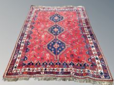 A Khamseh carpet, South West Iran, 254cm by 270cm.