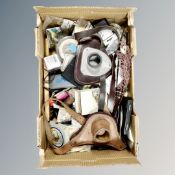 A box of assorted fishing accessories