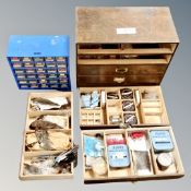 A five drawer wooden chest together with miniature twenty five drawer chest containing fly making