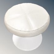 A mid century cream vinyl circular dressing table stool on metal base