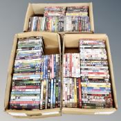 Three boxes containing approximately 150 dvds
