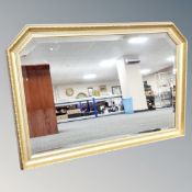 A gilt framed bevelled mirror