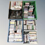 A collection of dvds and cds together with microwave