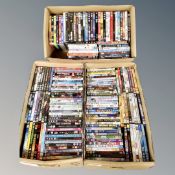 Three boxes containing approximately 150 dvds