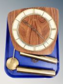 A 20th century Junghans wall clock with pendulum and weights