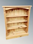 A set of pine open bookshelves,