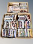 Three boxes of approximately 150 DVD's