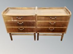 A pair of Scandinavian teak three drawer bedside stands,