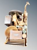 A box containing assorted treen, including carvings, candlesticks, trinket box.