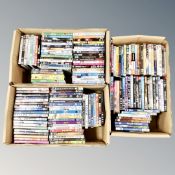 Three boxes of approximately 150 DVD's