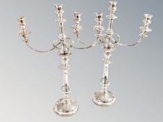 A pair of silver plated three sconce candelabra, height 49 cm.