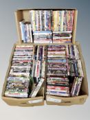 Three boxes of approximately 150 DVD's