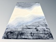 A William Yeoward Onda Indigo wool rug, 200 cm x 300 cm, as new, retailed £1650.00.