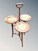 An inlaid mahogany cake stand
