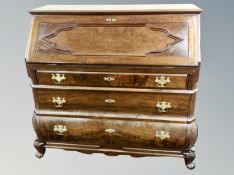 A continental walnut fall fronted bureau,