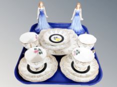 A thirteen piece English pink rose patterned tea service together with a pair of Royal Doulton