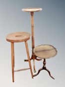 A turned mahogany tripod plant stand,
