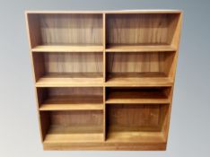 A set of 20th century teak open bookshelves,