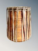 A heavy African wooden drum,