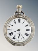 An oversized pocket watch,