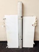 A projector screen together with two flat panel electric heaters