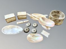 An ornate brass and glass bottle coaster, four rock crystal and faux turquoise buttons,