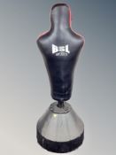 A BSL Sports floor standing punch bag