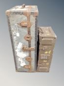 A vintage metal bound shipping trunk and an ammunition crate