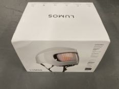 Four Lumos Matrix adult urban helmets with lights