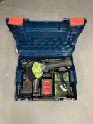 A Bosch professional 18 volt angle grinder in box.