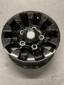 An un-used alloy wheel