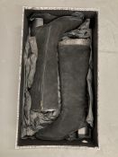 A pair of Duo Boots : black suede boots, size 36,