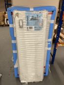 A compact high efficiency radiator 400-22-1200 together with a double 22 600 ml by 1200 ml radiator