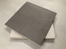 Four inter-lockable gym mats.