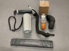 A pool filter pump together with further foot pump, tarpaulin,