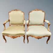 A pair of continental carved beech armchairs