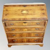 A reproduction Yewwood bureau