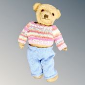 A vintage jointed teddy bear and a boxed set of four miniature plated goblets