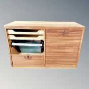 A Scandinavian teak shutter fronted office cabinet with key,