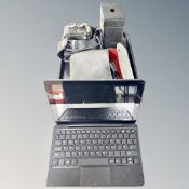 A tray of Ventora 10 x 50 binoculars and vintage cameras, a Linx notebook.