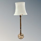 A turned beech standard lamp
