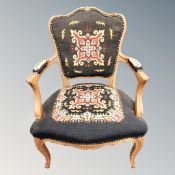 A carved beech salon armchair