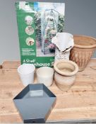 A Garden Essentials four shelf greenhouse, boxed,