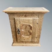 A Continental oak single door wall cabinet ,